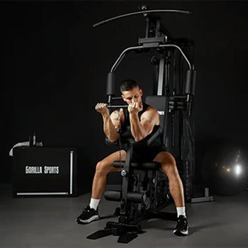 lat pulldown with butterfly and weights on protective floor mat